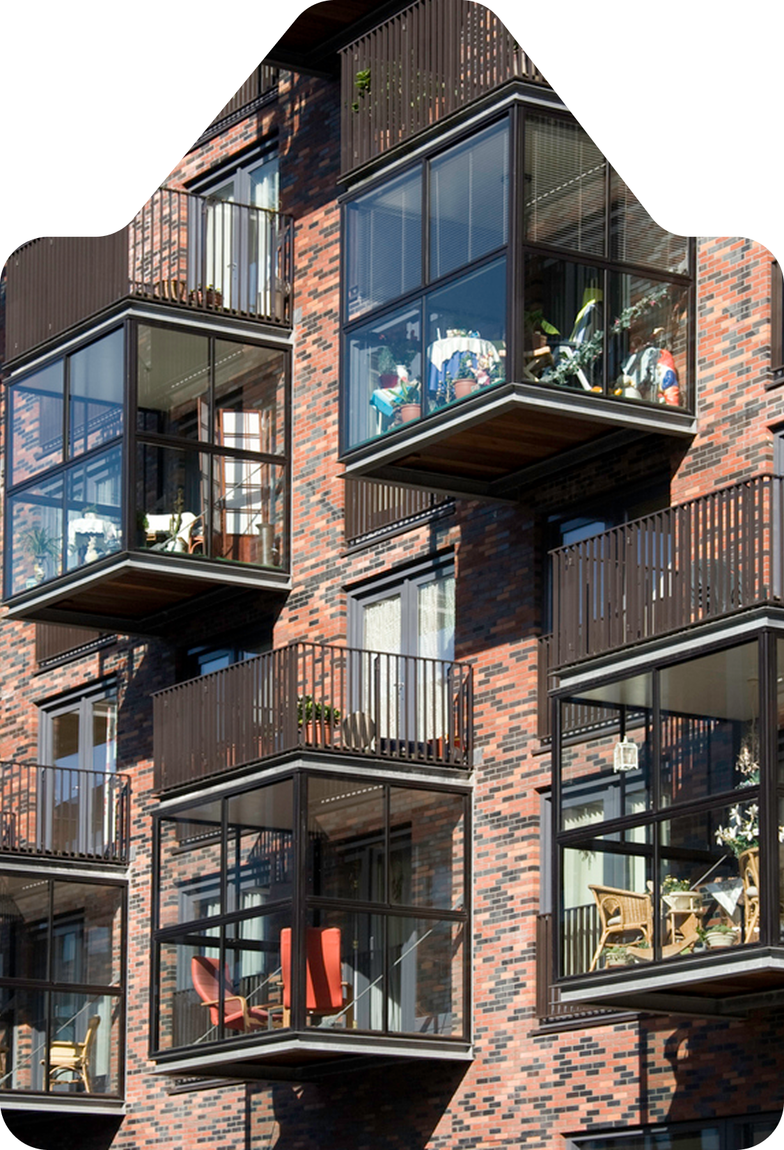 Couple looking at mobile phone for selling their house