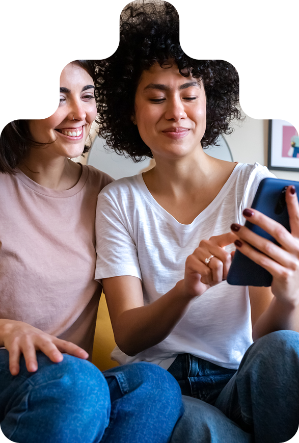 2 people looking at mobile phone